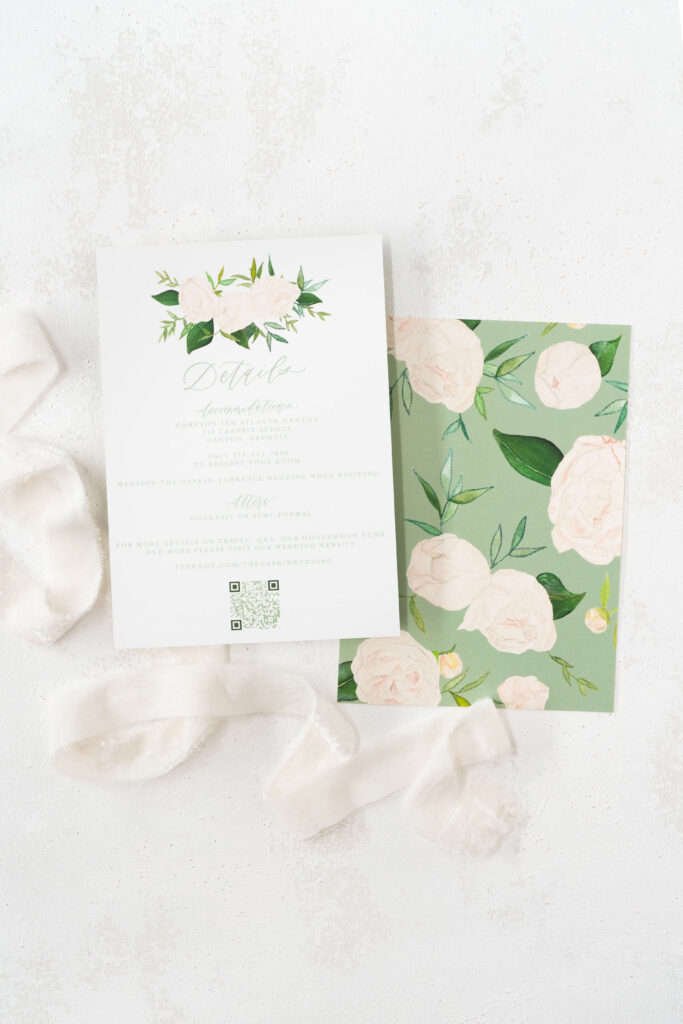 Custom details card features accommodation information and important details as well as a custom QR code to take guests to their wedding website to RSVP.