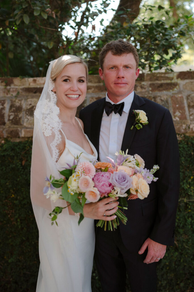 Olivia Rae James photographer captured bride and groom in Charleston, South Carolina for their garden party wedding.