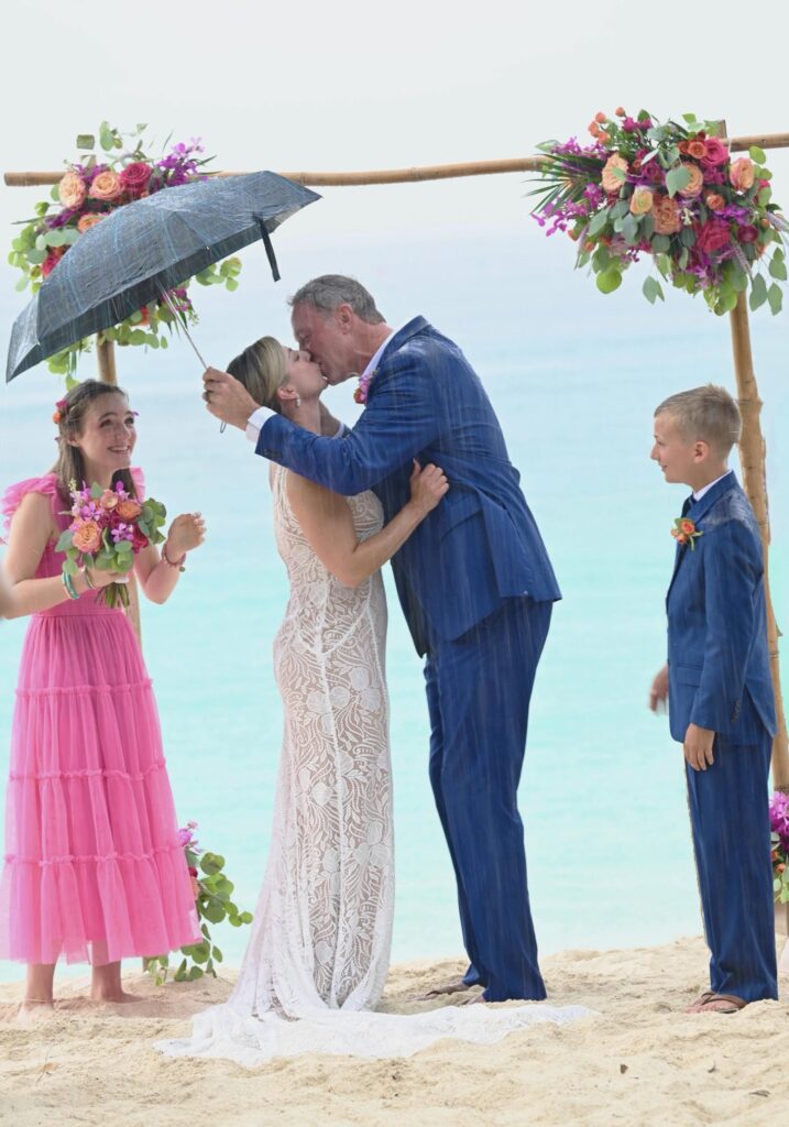 Bride and Groom first kiss in US Virgin Islands destination beach wedding.