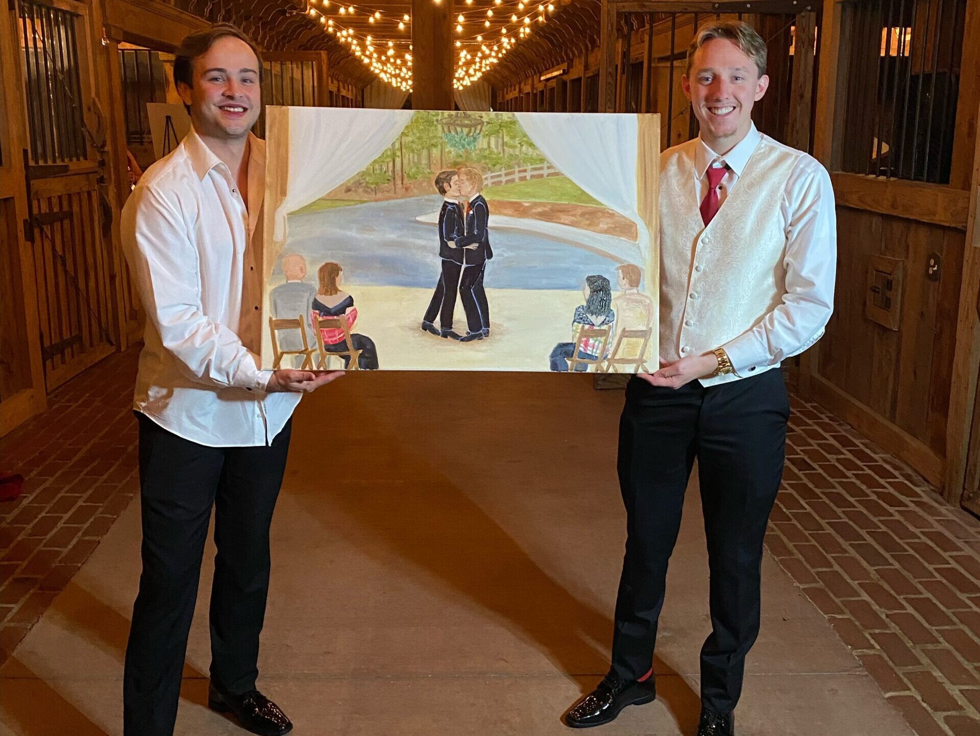 Two grooms with live wedding painting at their Farm at Rome GA wedding.