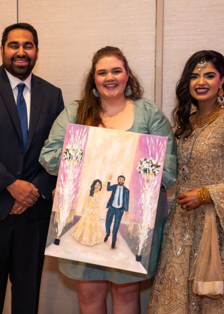 Wedding ceremony painter E Stokes Creations working at Indian wedding